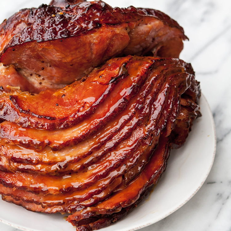 slow cooker ham on a white plate