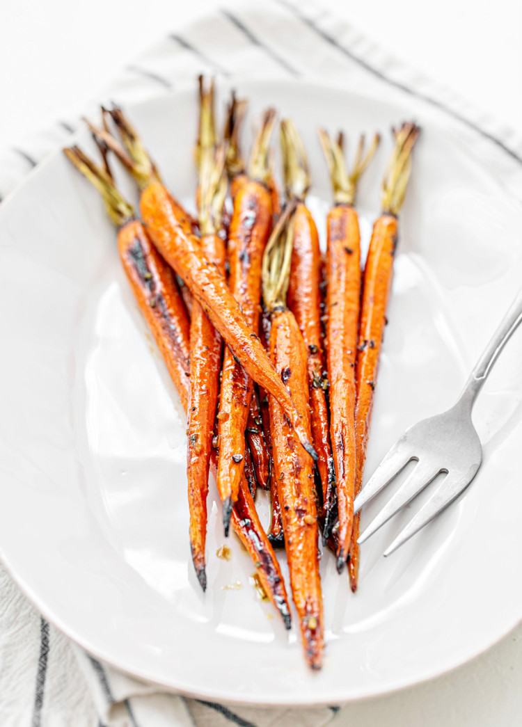 balsamic honey roasted carrots on a white serving platter
