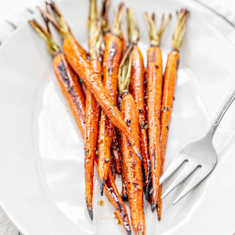 balsamic honey roasted carrots on a white serving platter