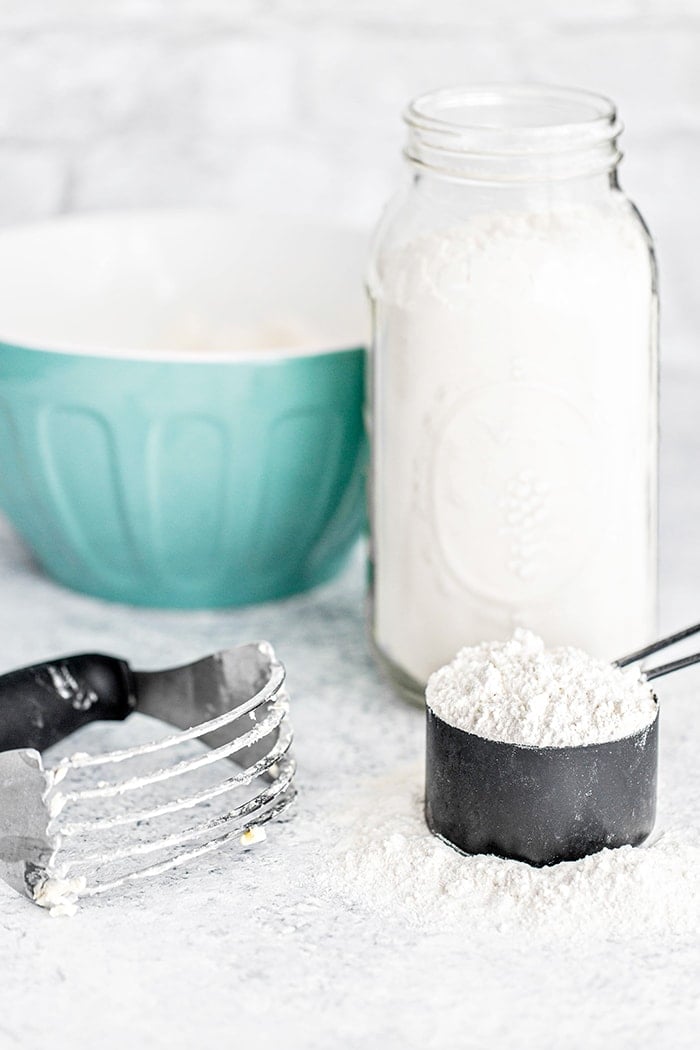 photo showing a method of cutting butter into flour