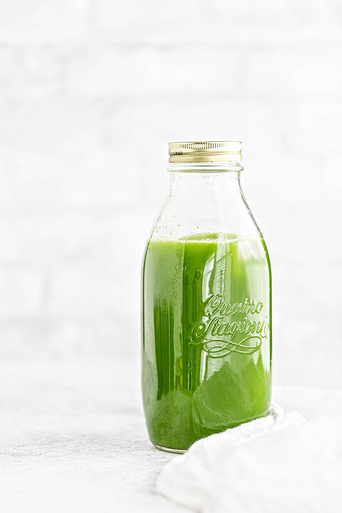 green juice in a glass jar