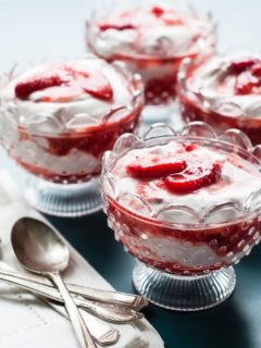 glass dish with strawberries and cream
