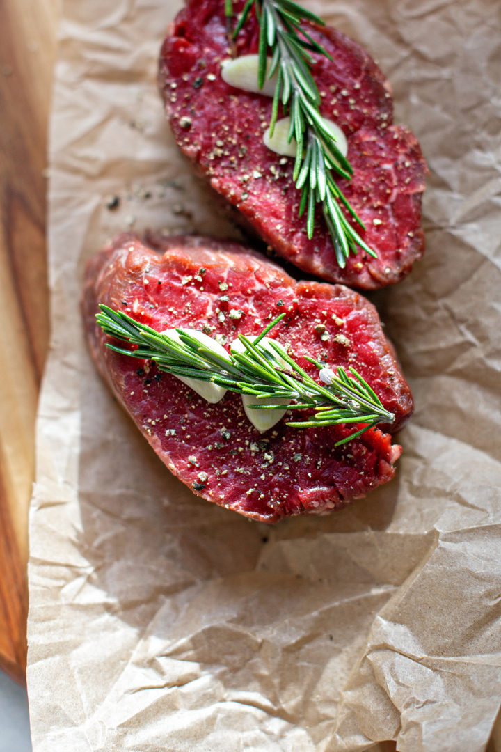 seasoning the steaks before preparing this sous vide filet mignon recipe