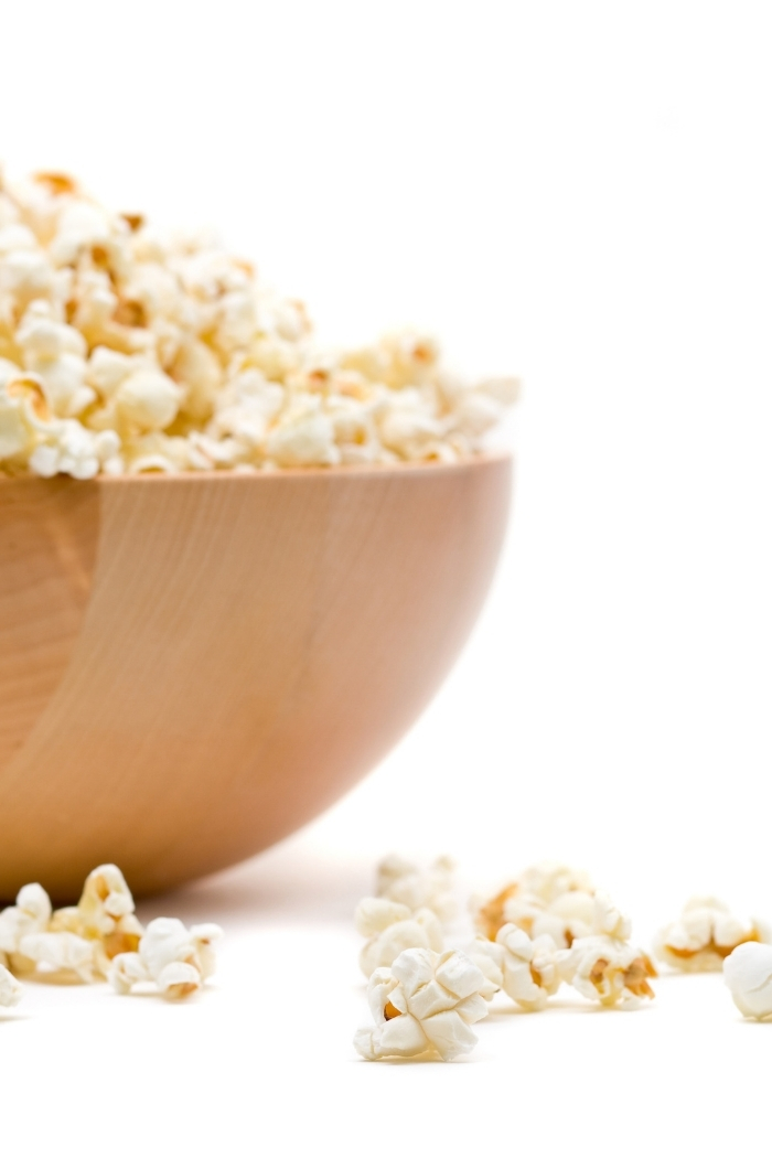 bowl of popcorn on white background