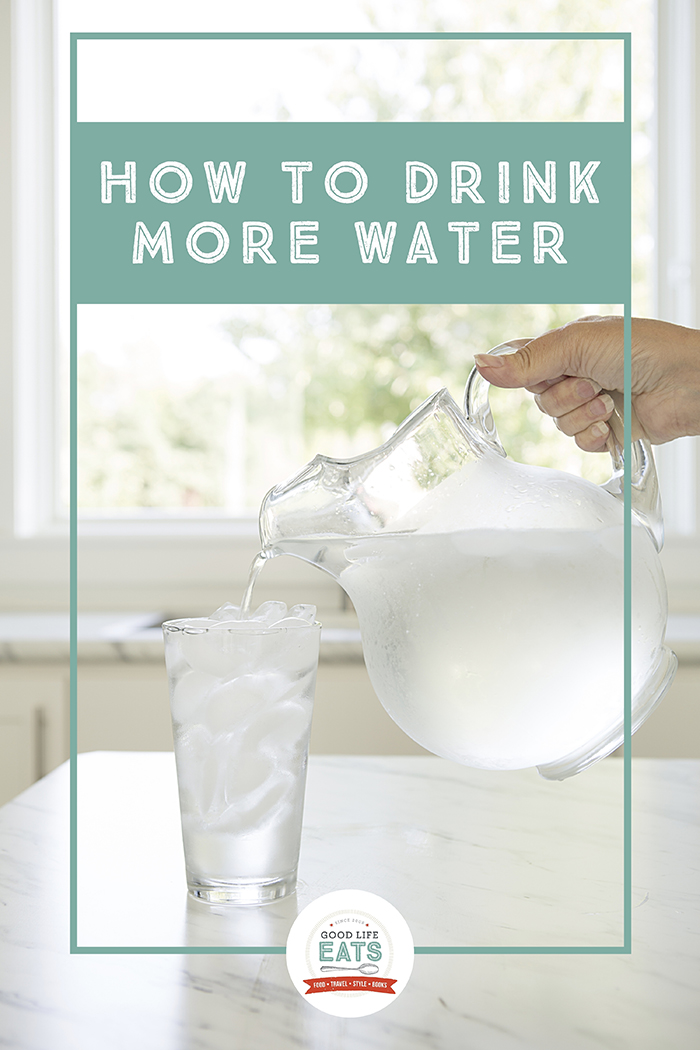 pitcher of water pouring into a glass