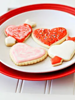a plate of decorated valentine's day cookies