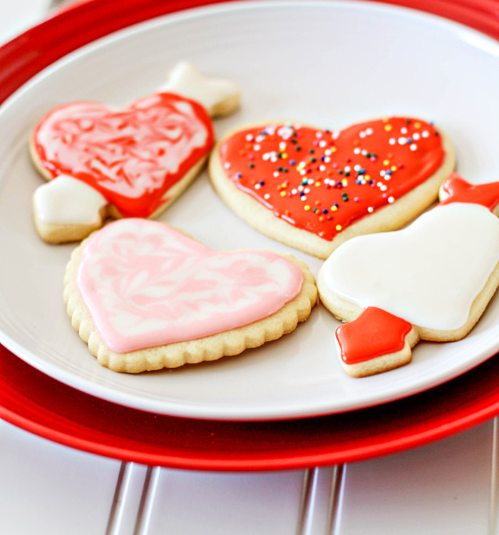 a plate of decorated valentine's day cookies