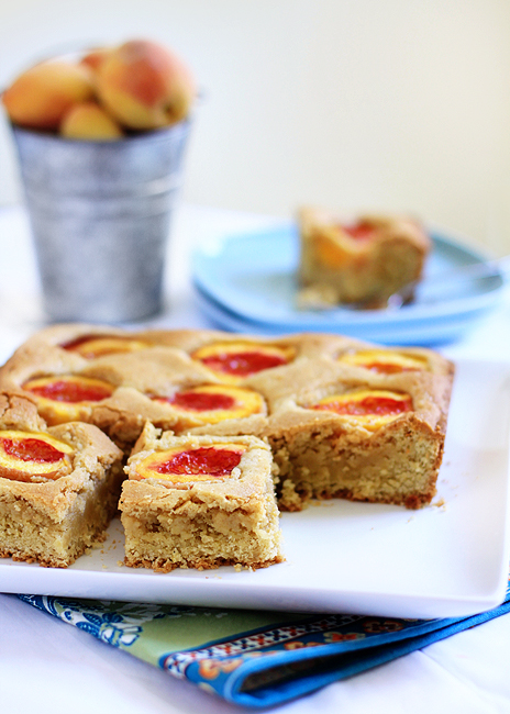 white plate with a peach cake on it