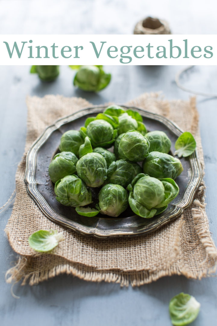 photo of raw brussels sprouts on a plate showing a winter vegetable