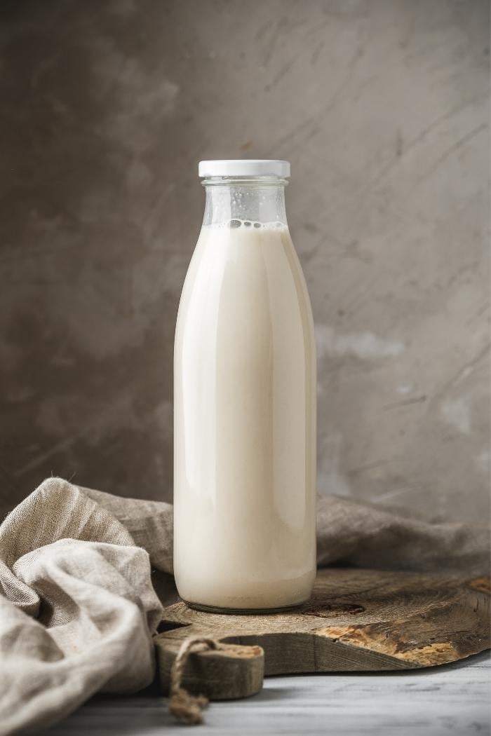 bottle of buttermilk on a cutting board 