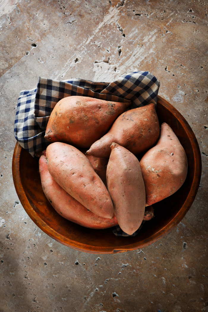 wooden bowl of sweet potatoes