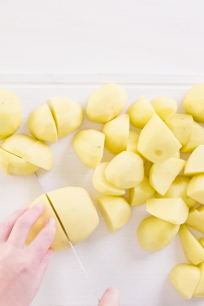 overhead shot of cutting potatoes for potato salad