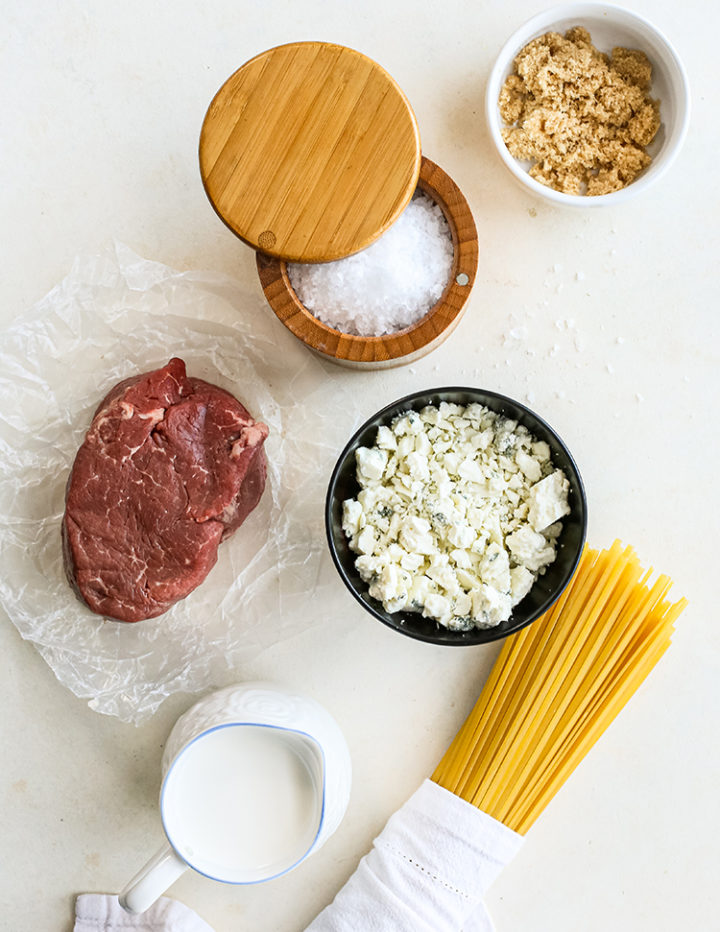 overhead shot of the ingredients to make gorgonzola pasta with beef tenderloin
