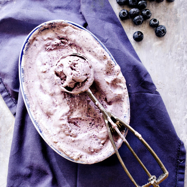 overhead shot of container of blueberry cheesecake ice cream