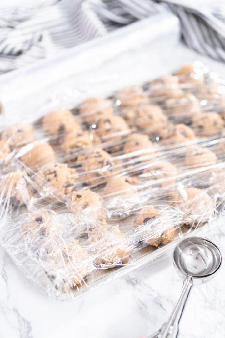 image of how to freeze cookie dough:  cookie dough on a baking sheet for the freezer