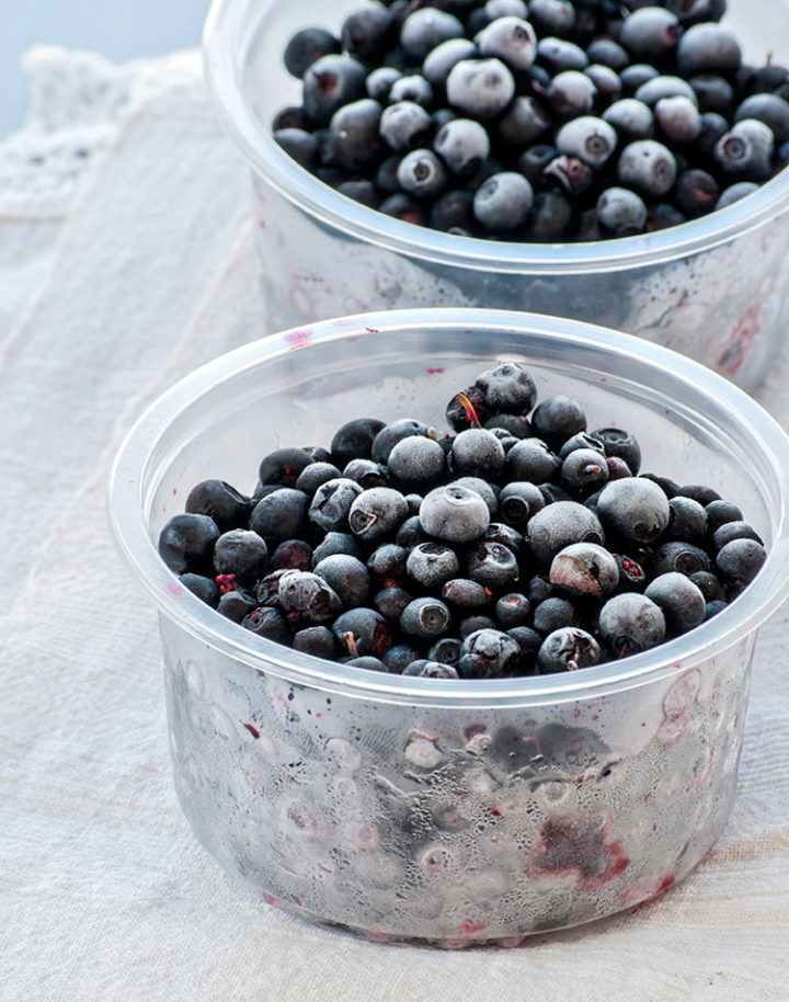 containers of frozen blueberries before freezing