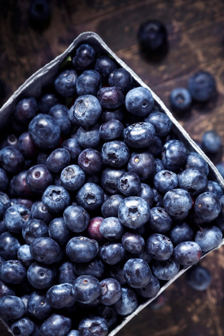 overhead shot of a container of blueberries to make blueberry cheesecake ice cream