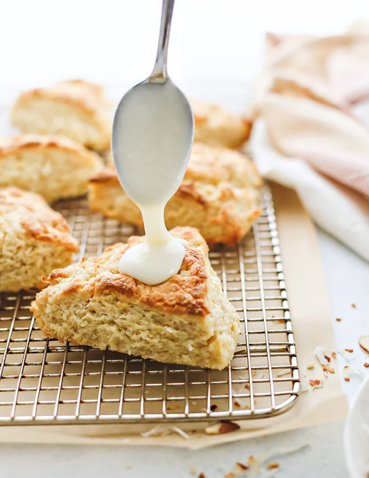 photo of drizzling glaze on coconut scones