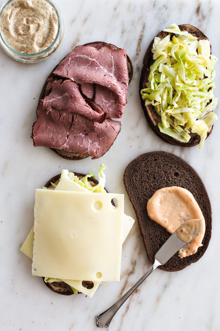 overhead shot of assembling a reuben sandwich