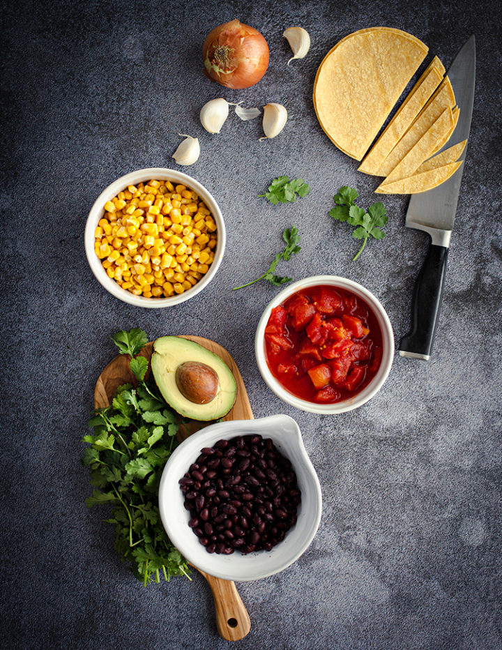 ingredients to make chicken tortilla soup on the kitchen counter