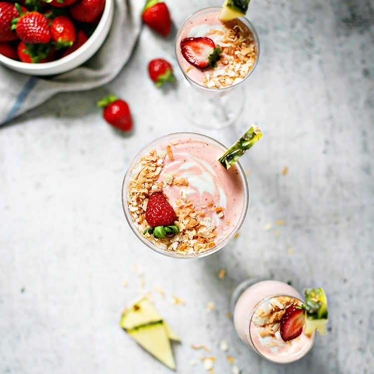 strawberry pineapple smoothie in glasses