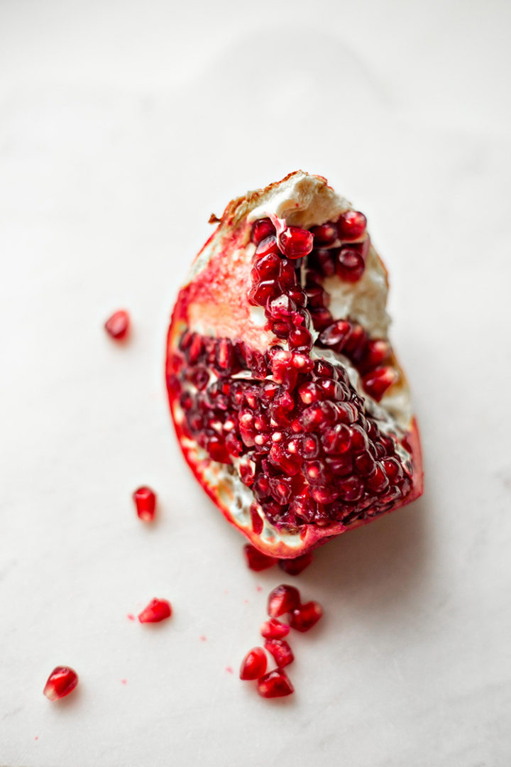 close up photo of a pomegranate for pomegranate sorbet garnish