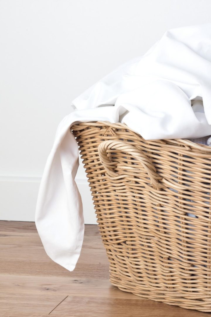 a basket of white clean laundry