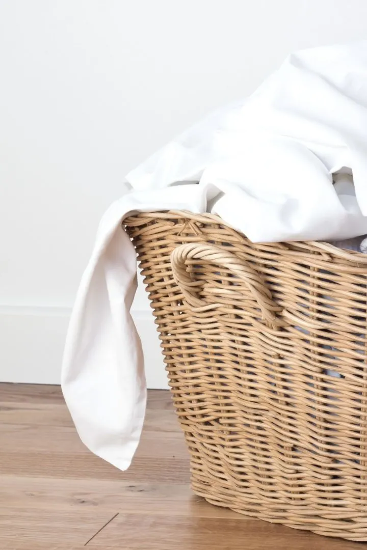 a basket of white clean laundry
