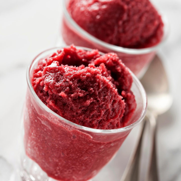 photo of pomegranate sorbet in glasses with spoons