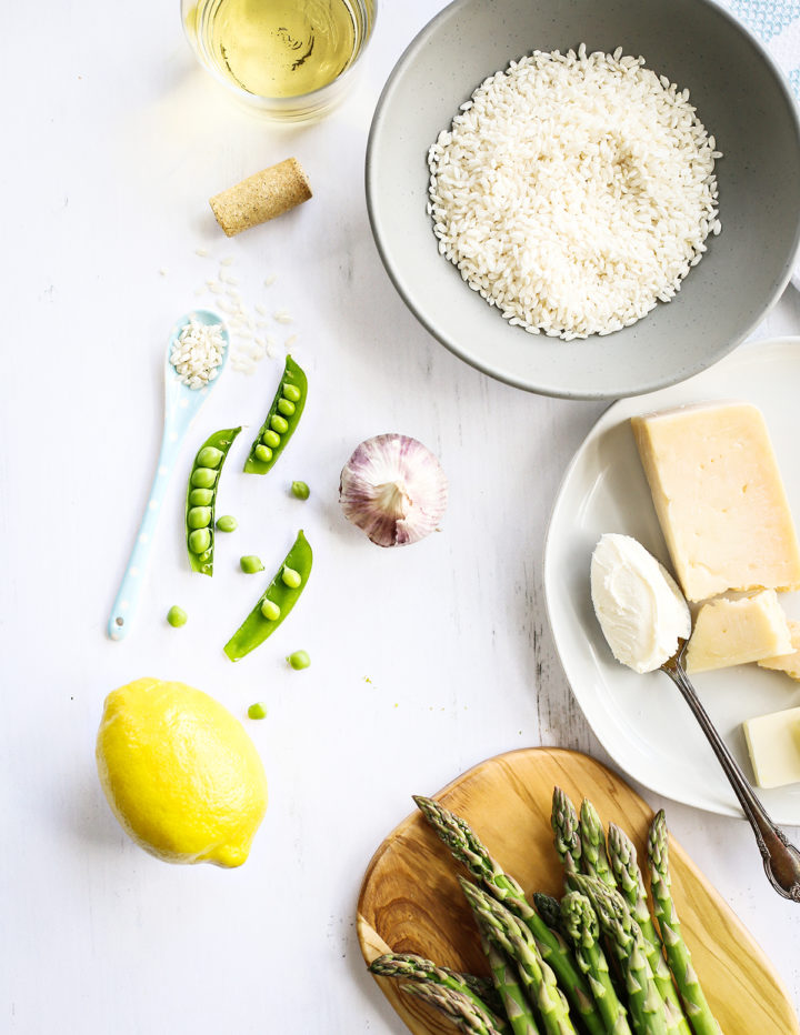 overhead photo of ingredients to make a recipe for asparagus risotto