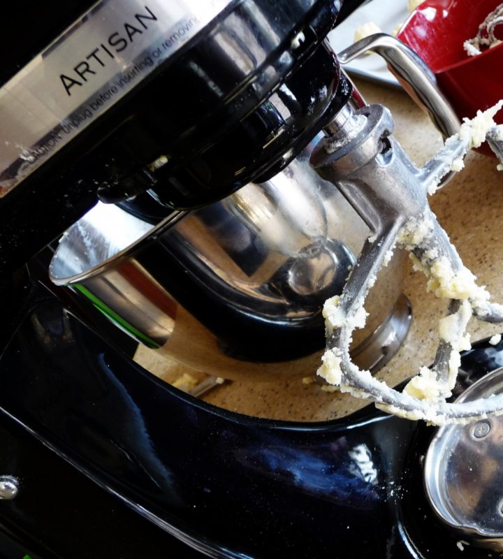 photo of a stand mixer preparing lemon white chocolate cookie dough