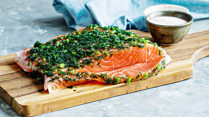 photo of gravlax (norwegian salmon) being prepared