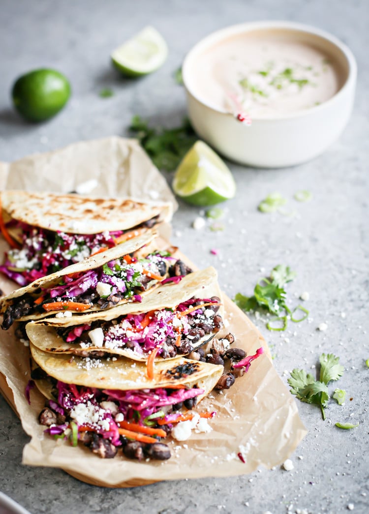 photo of Crispy Black Bean Tacos with Cilantro Lime Slaw on a cutting board