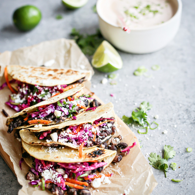 photo of Crispy Black Bean Tacos with Cilantro Lime Slaw on a cutting board