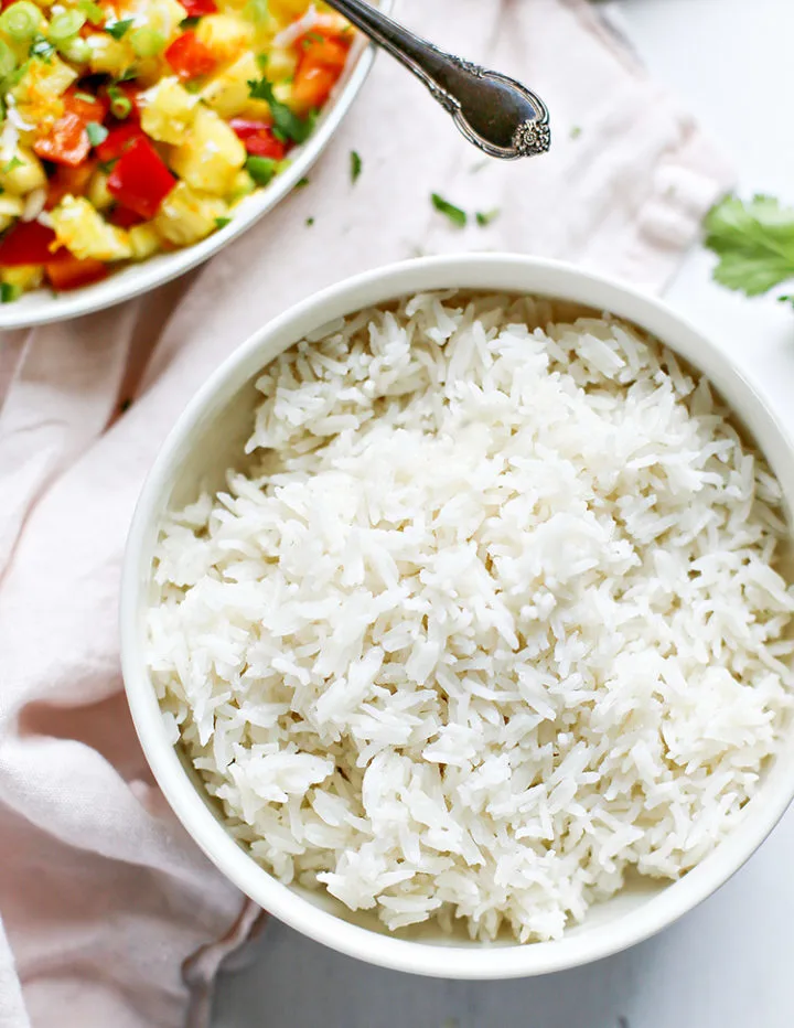 a photo of a bowl of coconut rice to serve with pineapple salsa chicken
