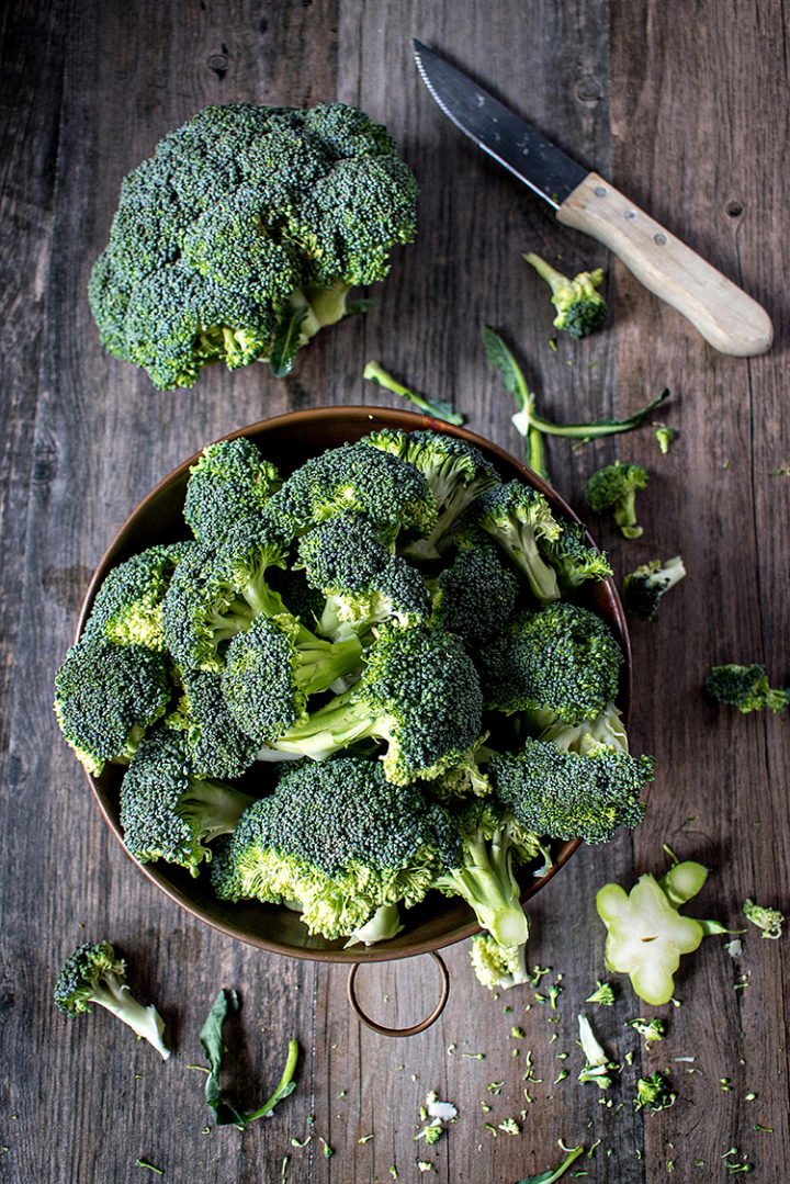 photo of broccoli florets with a knife for a roasted broccoli recipe