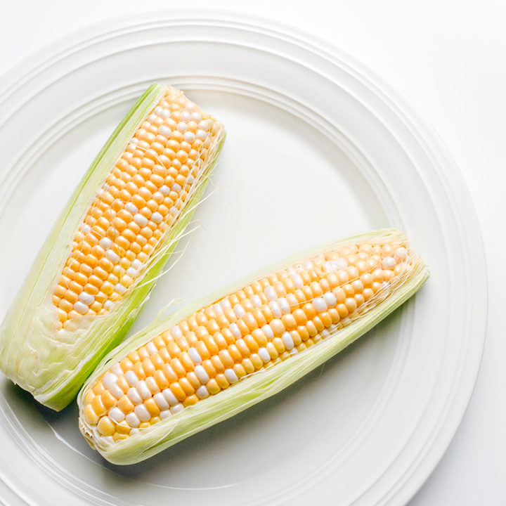 photo of corn on the cob on a plate