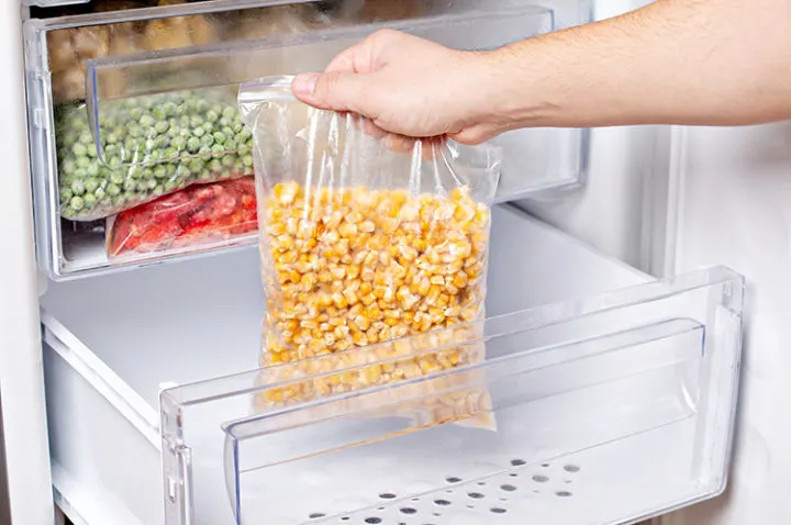 photo of frozen corn in a bag in the freezer