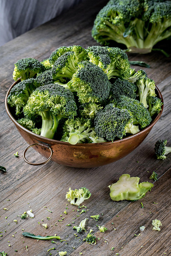 photo of broccoli being prepped before making roasted broccoli