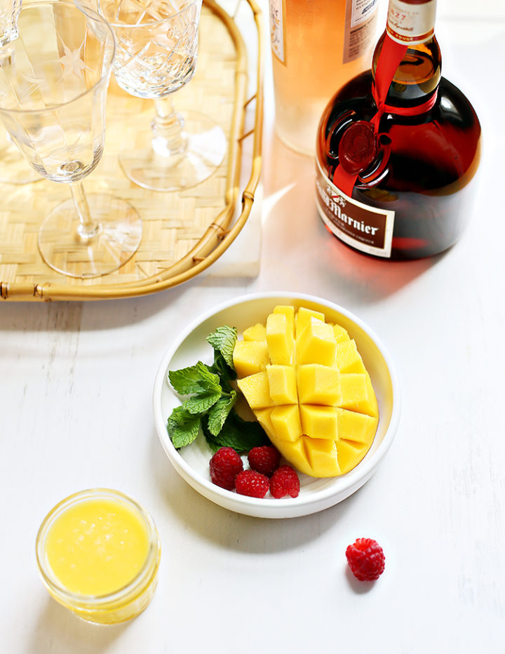 photo of fresh mango and raspberries for a rosé sangria recipe