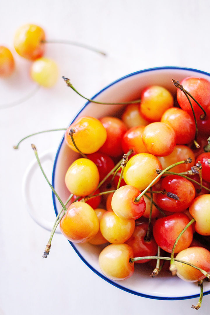 a photo of different types of cherries