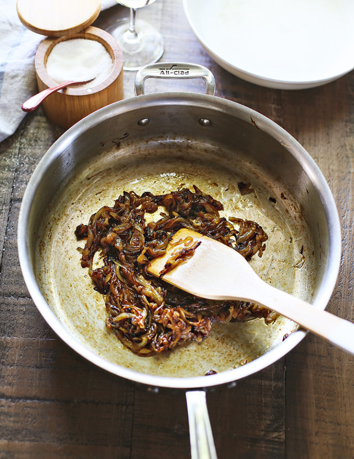 photo of caramelized onions in a stainless steel pan