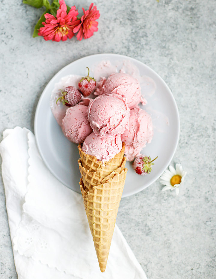 overhead photo of strawberry gelato on an ice cream cone