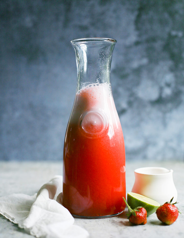 photo of a pitcher of strawberry agua fresca