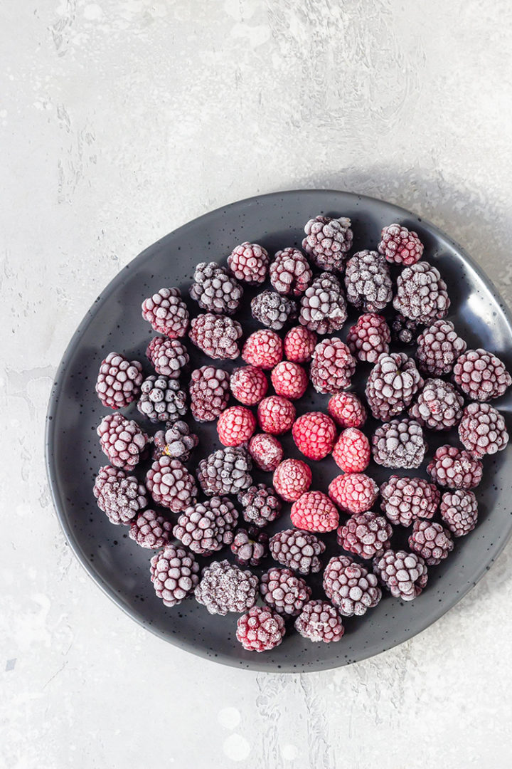 a photo of frozen blackberries for a how to freeze blackberries tutorial