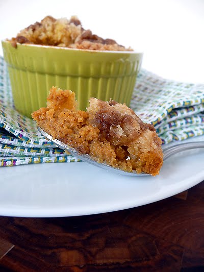 photo of pumpkin cobbler after baking with a spoon taking a bite