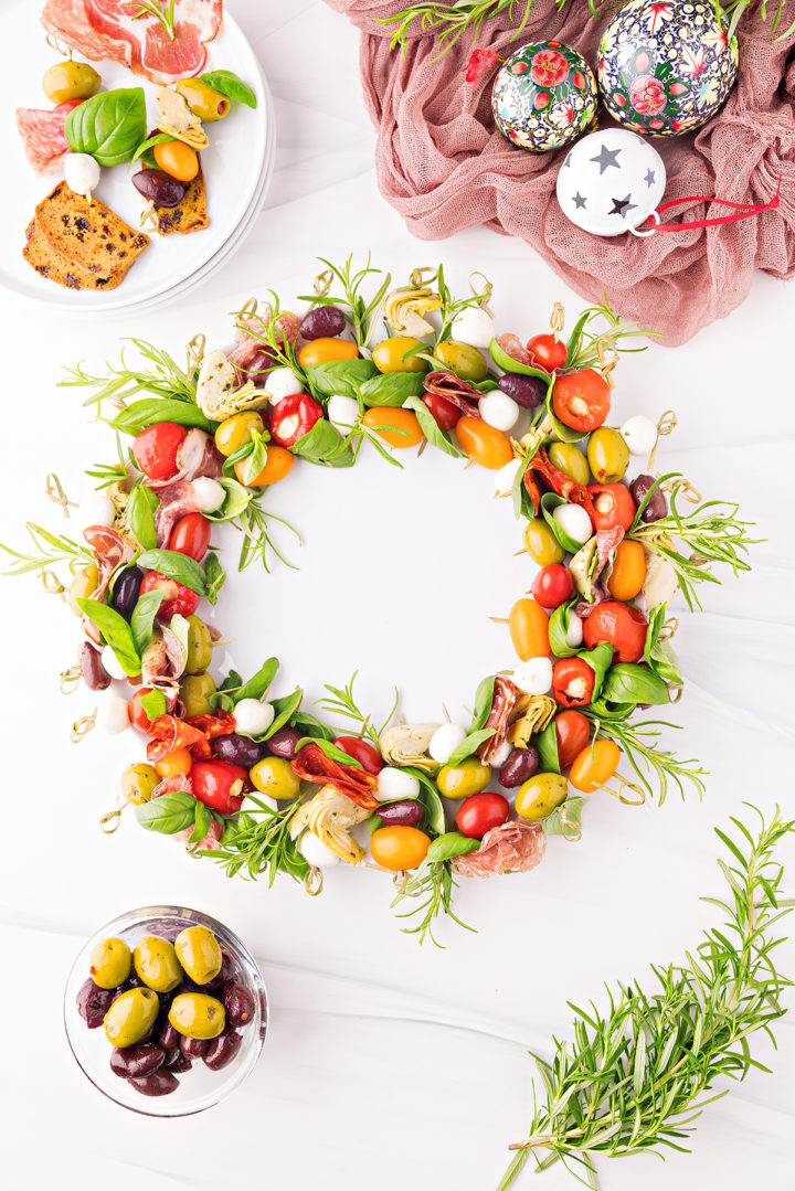 overhead photo of an antipasto wreath made from antipasto skewers