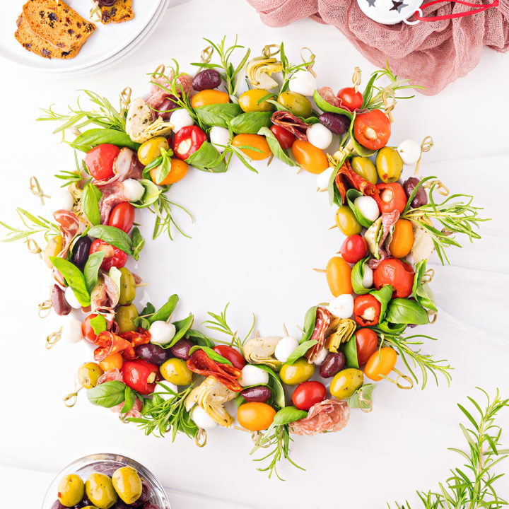 overhead photo of an antipasto wreath made from antipasto skewers