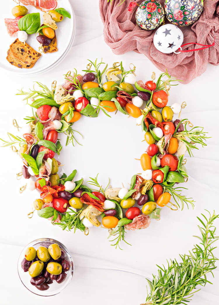 overhead photo of an antipasto wreath made from antipasto skewers