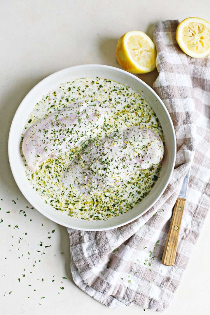 photo of chicken marinating in a Greek marinade for chicken